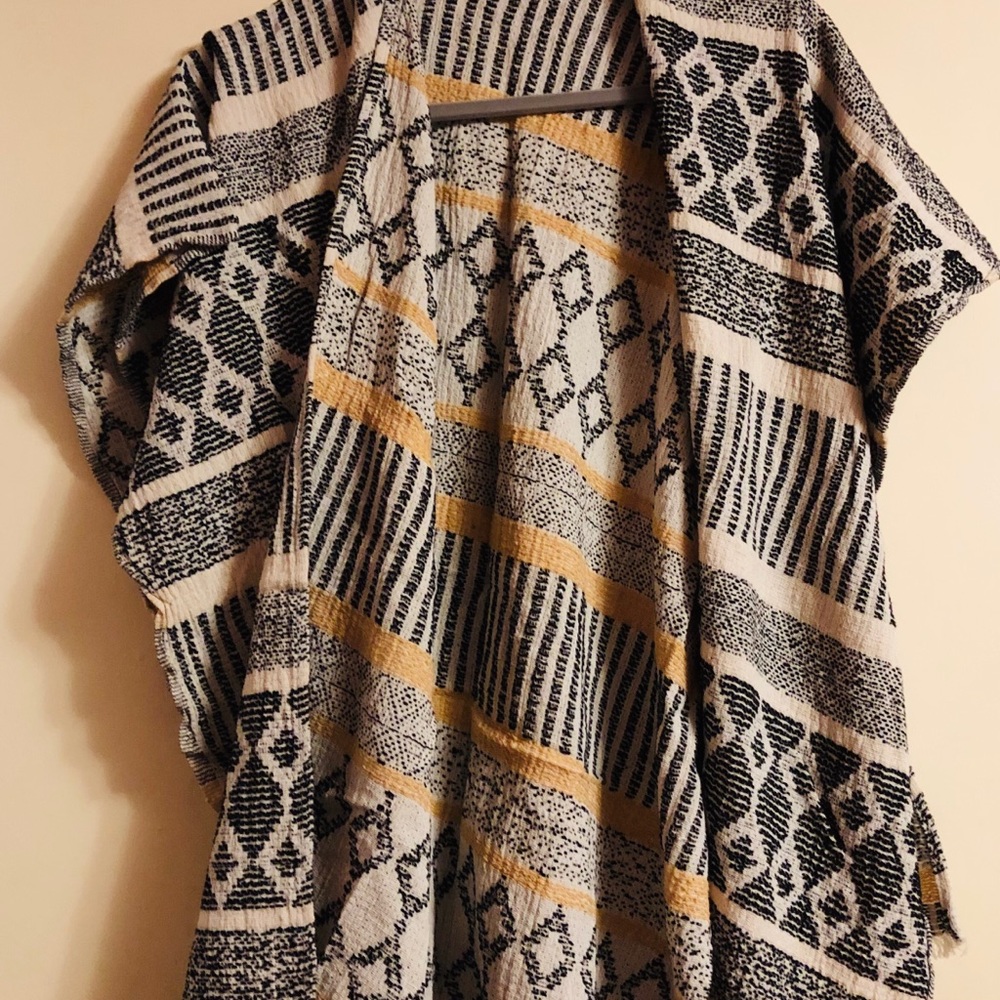 Cream, black and mustard knit poncho